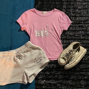 Pink and white vintage-inspired streetwear tee